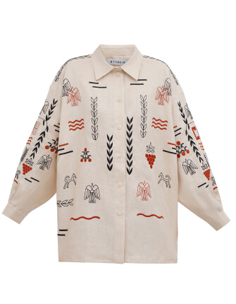 women's vyshyvanka in flesh color with long sleeves and a classic collar